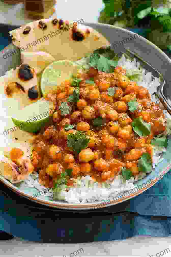 A Bowl Of Coconut Curry Chickpeas, Garnished With Cilantro Natural Flava: Quick Easy Plant Based Caribbean Recipes
